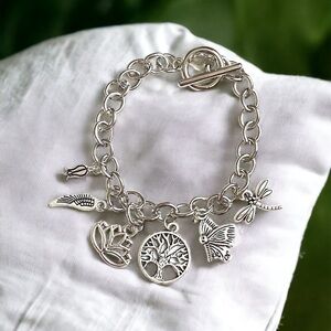 171 “Ways of Life” silver tone charm bracelet